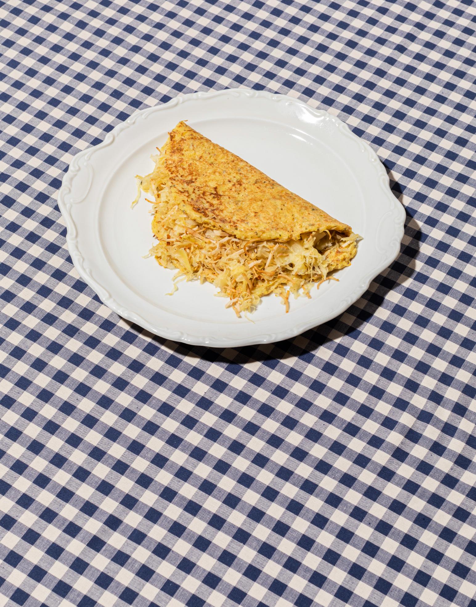 Kartoffelpuffer gefüllt mit Sauerkraut und Schinken